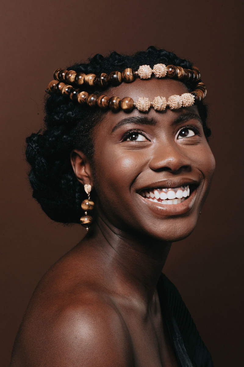 Collection of images showcasing an African-Canadian models hairstyles and clothing